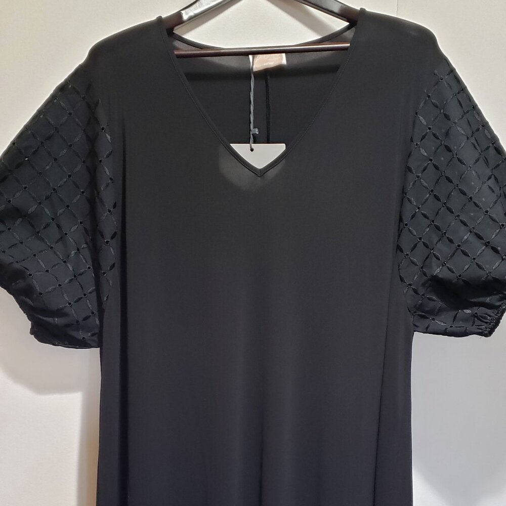 Black long dress with decorative sleeve by Marina Rinaldi